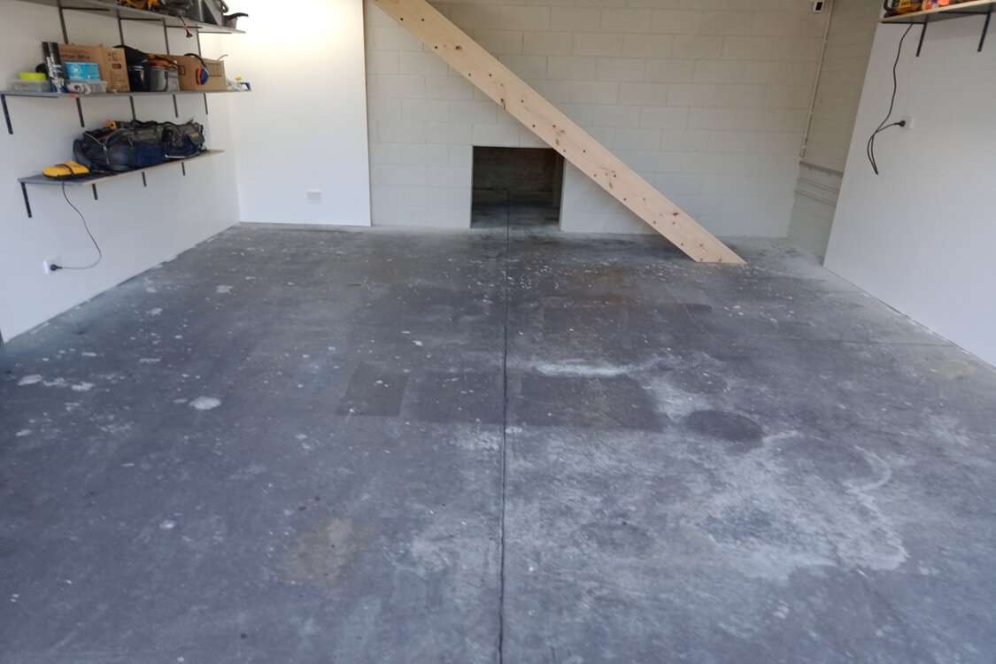 Messy garage floor in mixed colours
