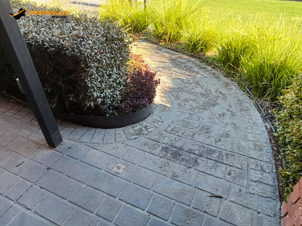 Outdoor paved surface before preparation and sealing
