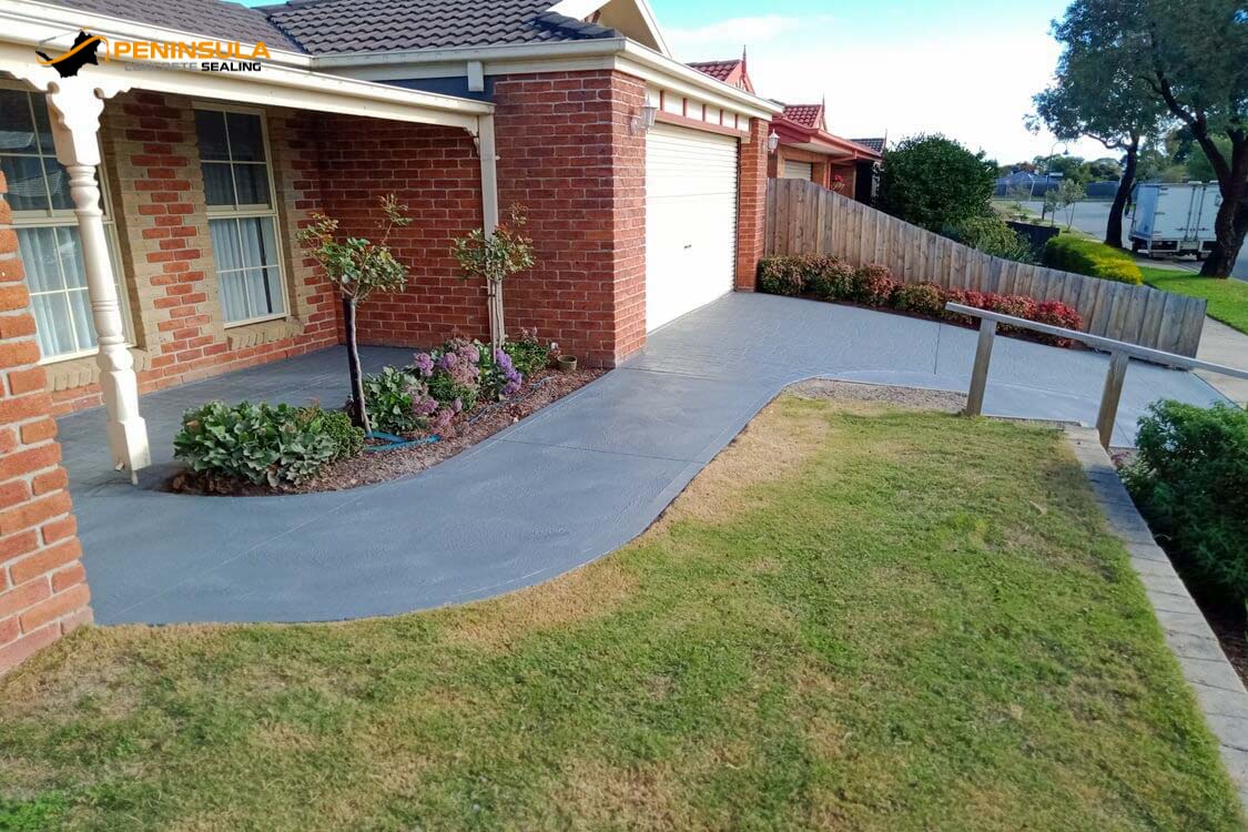 Freshly sealed outdoor paving finish in colour-enhancing coating