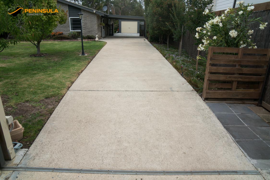 Old exposed aggregate driveway before resurfacing