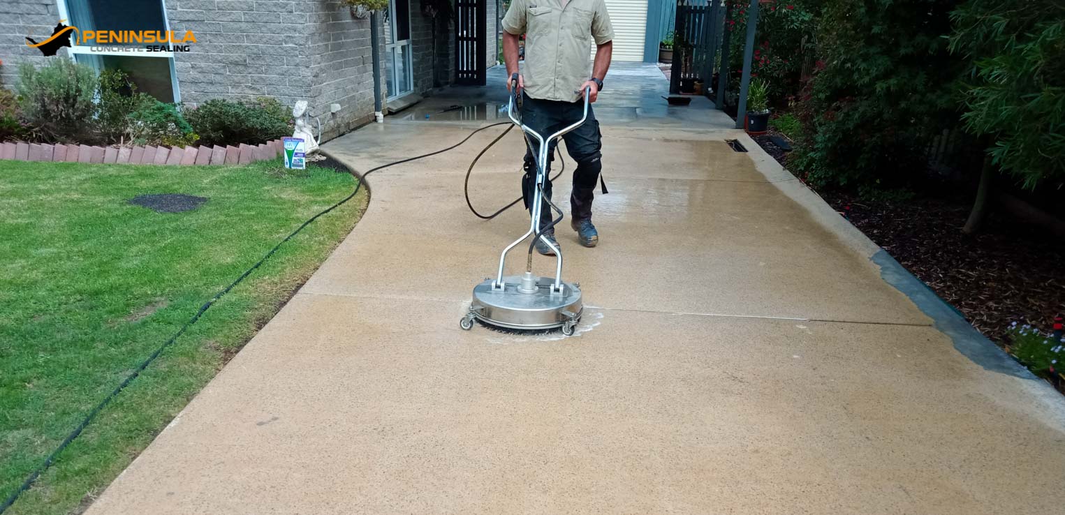 A man doing driveway cleaning on the Mornington Peninsula